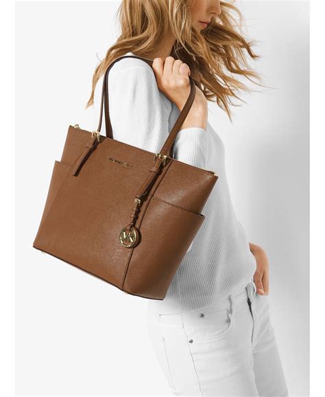 michael kors east west jet set top zip tote|Michael Kors saffiano jet set.